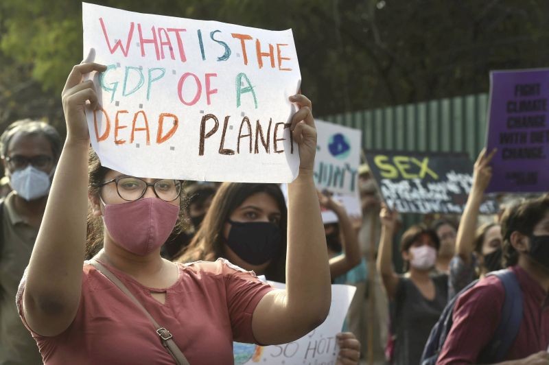 New Delhi: Protestors hold placards during a protest march from ITO to Delhi Secretariat against global warming, in New Delhi, Friday, March 19, 2021. (PTI Photo/Arun Sharma)