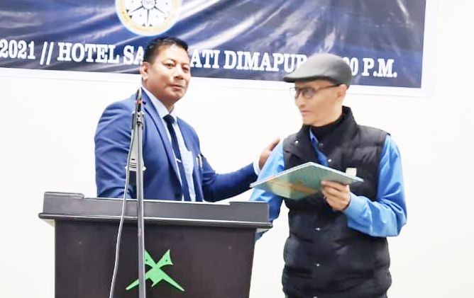 ENPO outgoing President T Kekongchim handing over charge to the new President C Sashi Naga at Hotel Saramati Dimapur on March 31. (Photo Courtesy: ENPO)