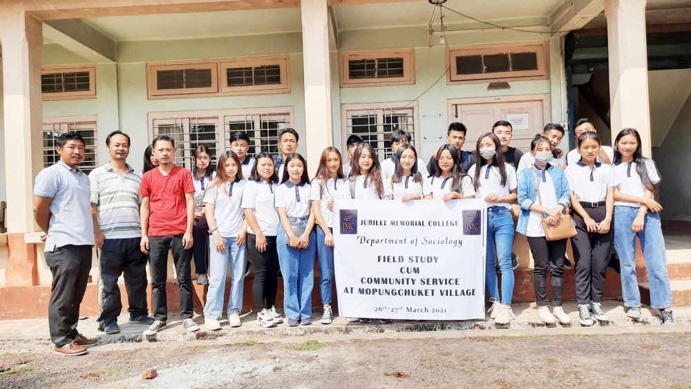 Department of Sociology, Jubilee Memorial College, visited Mopungchuket village for a field study and extended community service by donating dust bins to the Mopungchuket Community Tourism Society on March 27. Seen in the picture are the students and members of the Mopungchuket Community Tourism Society. (Morung Photo)