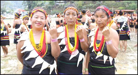Konyak women show their bands that had bar codes which were activated when 4687 of them danced together invoking traditional blessing on April 5 during the Aoleang Monyu festival at Mon Town – it set the Guinness World Record for the Largest Traditional Konyak Dance. (Morung Photo)