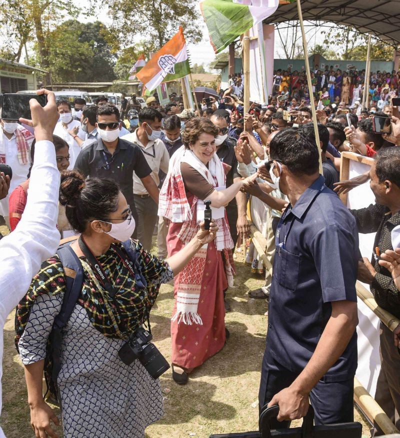 Congress leader Priyanka Gandhi meets public during an election campaign rally ahead of Assam assembly polls, at Purabangla in Golaghat district on March 22, 2021. (PTI Photo)