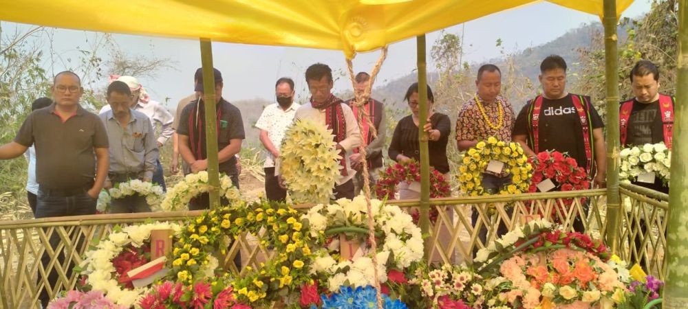 The Peace missiion team at the graves of the three persons who were killed in the March 22 incident at Lamhainamdi village under Peren district. (Photo Courtesy: TUD)