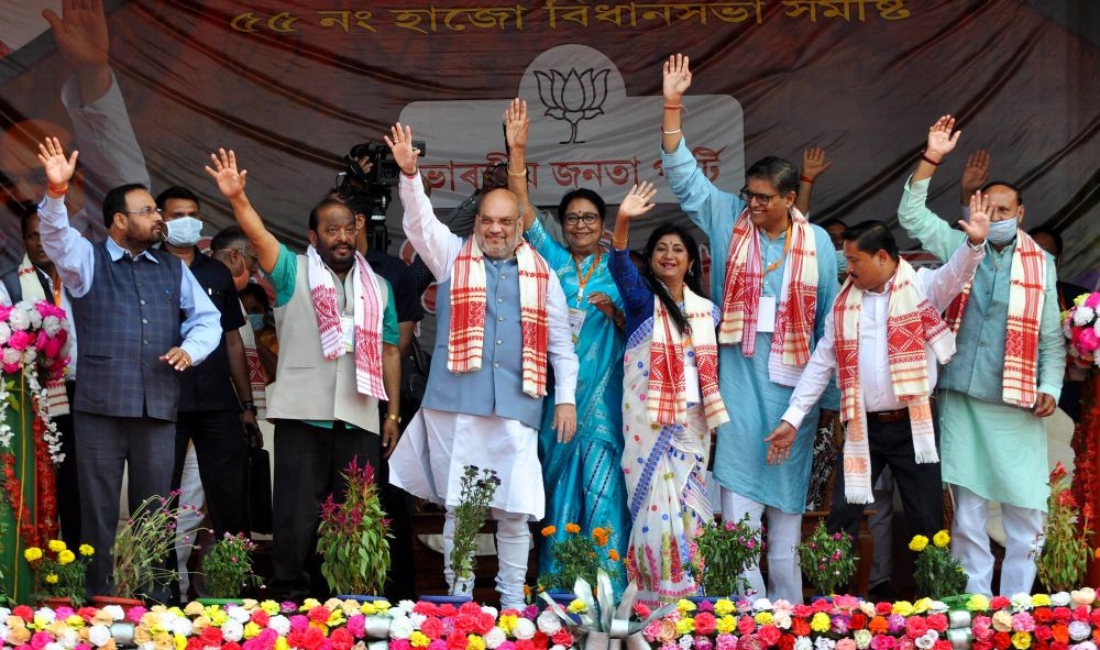 Kamrup: Union Home Minister Amit Shah waves at public during an election campaign rally for Assam Assembly polls, at Haju, in Kamrup district, Wednesday, March 31, 2021. (PTI Photo)