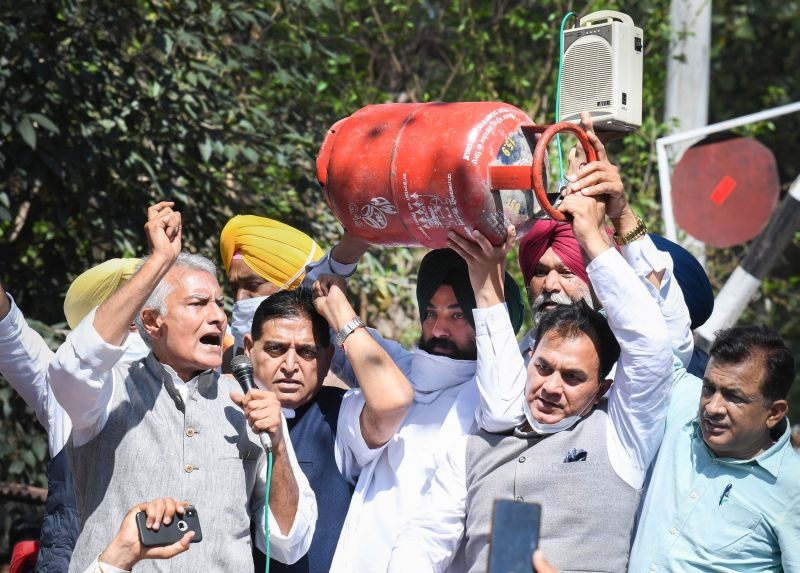 Congress leaders protest against fuel price hike outside Punjab Governors' House in Chandigarh on March 1. (PTI Photo)