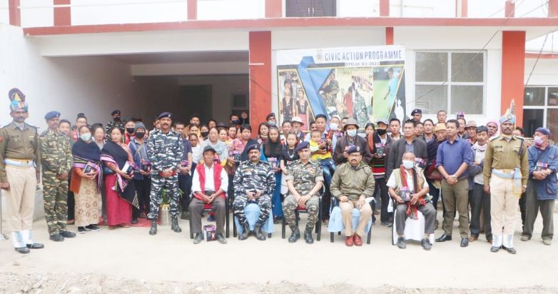 CRPF 78th battalion officials with villagers during the distribution of solar lamp at Dzudza village on March 8.