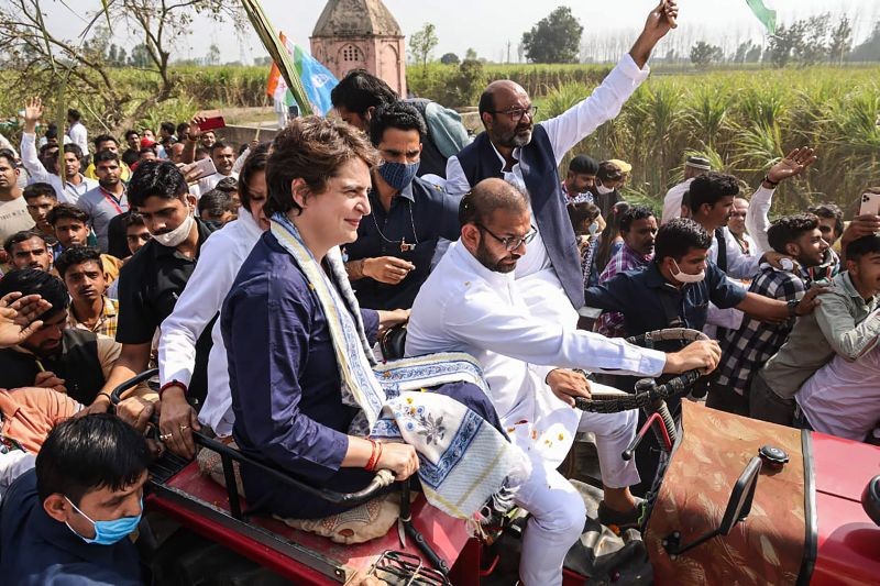 Meerut: Congress General Secretary Priyanka Gandhi rides a tractor to attend a Kisan Mahapanchayat, in Meerut district, Sunday, March. 7, 2021. (PTI Photo)