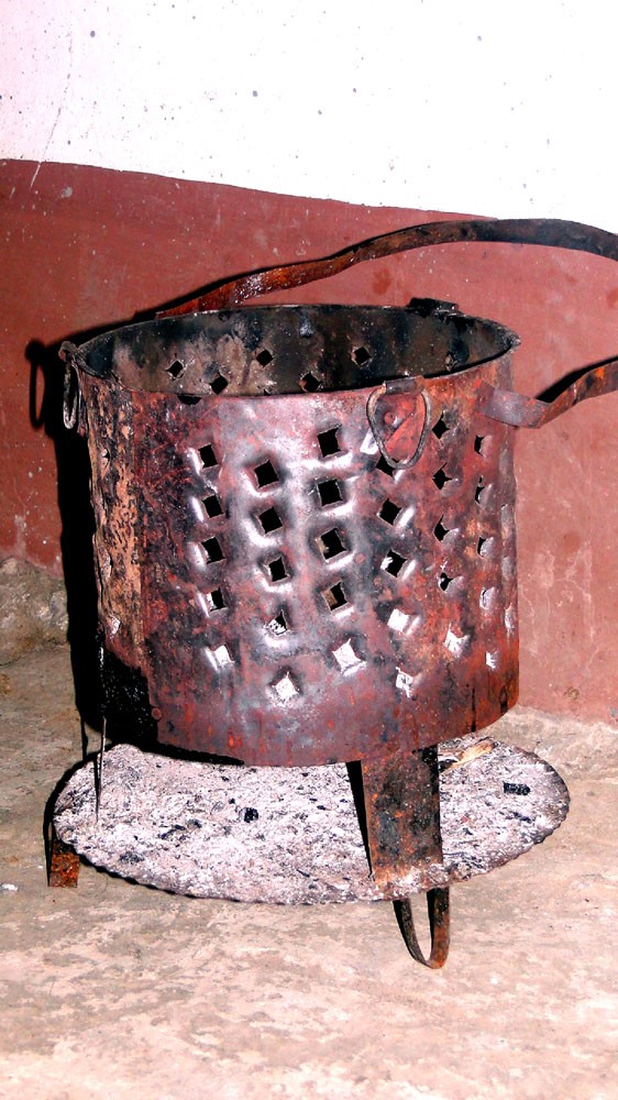 A Local Charcoal Grill / Chulha used for room heating using charcoal.