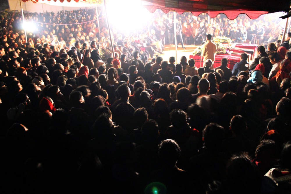 A PAUSE BEFORE ETERNITY: Mourners gather to listen to eulogies to four youths who died on the intervening night of January 4-5 in Kohima, caused by what is believed to be poisoning after inhaling emissions from burning charcoal in the room the deceased were sleeping in. (Imchawapang Jamir Photo)