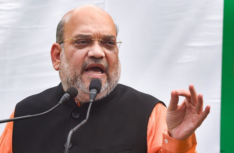 New Delhi: Union Home Minister Amit Shah addressing a press conference at his residence, in New Delhi, Sunday, March 28, 2021.( PTI Photo/Manvender Vashist)