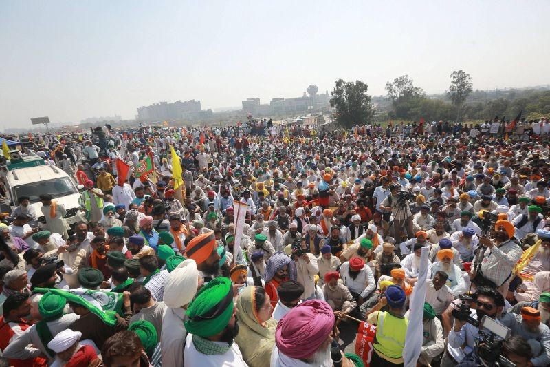 New Delhi: Farmers block a highway to mark 100 days of their ongoing protests against new farm laws, along the Delhi-Haryana border near New Delhi, Saturday, March 6, 2021. (PTI Photo)