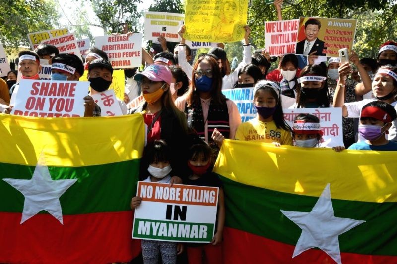Myanmar refugees staged a protest against China's support to the new military rule in Myanmar at Jantar Mantar in New Delhi on  March 3, 2021. (IANS Photo)