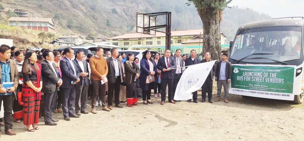 Minister Neiba Kronu and others during the flagging off of EA’s bus service for Women Street Vendors at Pfutsero.