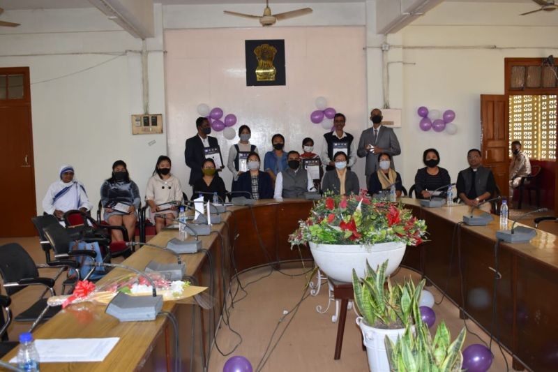 DC Dimapur Rajesh Soundararajan with awardees during the celebration of International Women's Day on March 8. (DIPR Photo)
