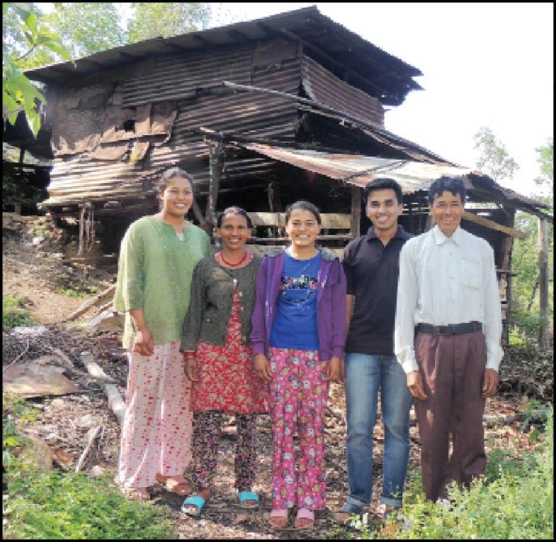 (Center) Momita Karki with her family. (Morung Photo)