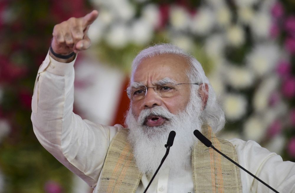 Ahmedabad: Prime Minister Narendra Modi speaks during the flag-off ceremony of the Dandi March or Salt Movement to celebrate the 75th anniversary of India’s Independence, in Ahmedabad, Friday, March 12, 2021.  The Salt Movement, which took place from March to April 1930, was an act of civil disobedience led by Mahatma Gandhi to protest against British rule in the country.  (PTI Photo/Kamal Kishore)