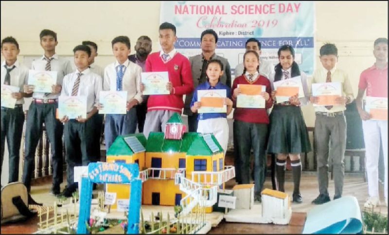 Students holding their certificate along with DC, ADC and DEO during the National Science Day organized by District Education Office, Kiphire on April 13. (Morung Photo)