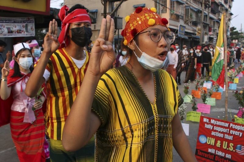 Anti-coup protesters shout slogans during a rally in Yangon, Myanmar on on March 25, 2021. Protesters against last month’s military takeover in Myanmar returned to the streets in large numbers Thursday, a day after staging a “silence strike” in which people were urged to stay home and businesses to close for the day. (AP Photo)