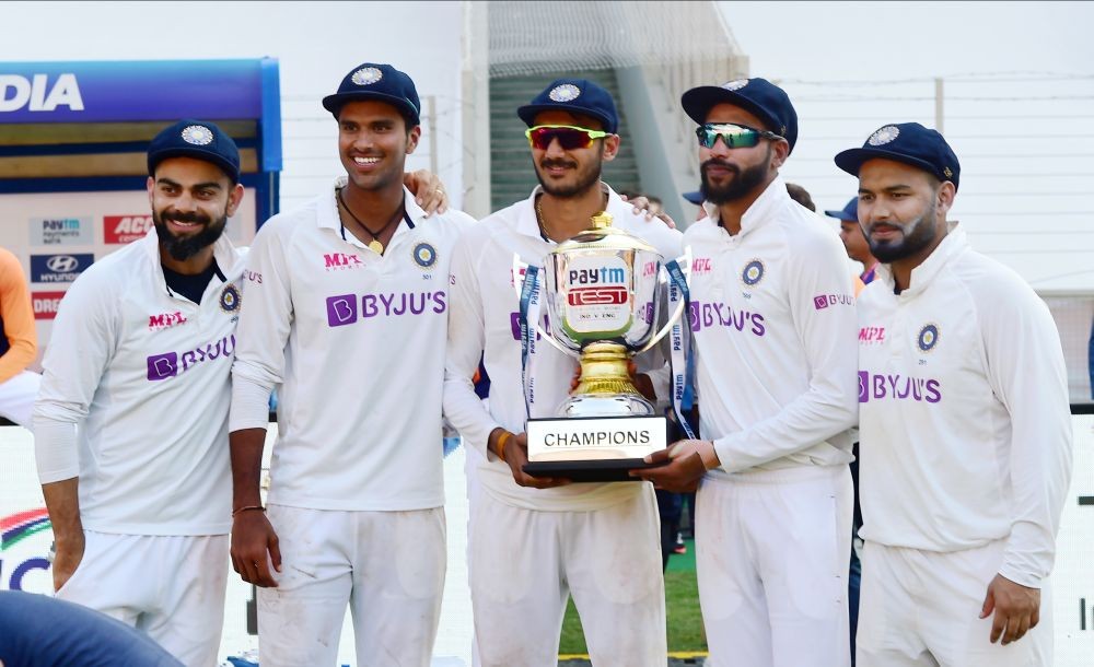 Ahmedabad: Indian cricket team players hold the torphy as they pose for photographs after defeating England during the third day’s play of the 4th and last test match of the series between India and England, at Narendra Modi Stadium in Ahmedabad, Saturday,  March 6, 2021. (PTI Photo/Kamal Kishore)