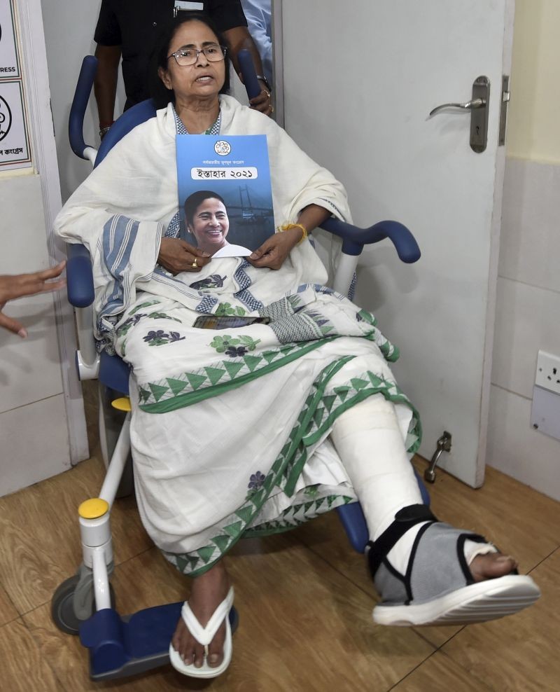 West Bengal Chief Minister Mamata Banerjee releases TMC manifesto ahead of the Assembly Election at her residence, in Kolkata on March 17, 2021. (PTI Photo)