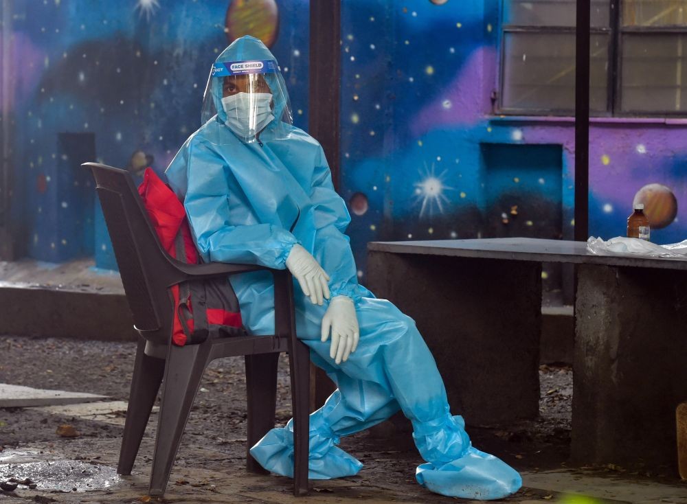 Mumbai: A municipal health worker while conducting screening for COVID-19 at a children's home in Mumbai, Wednesday, July 29, 2020. (PTI Photo/Mitesh Bhuvad)