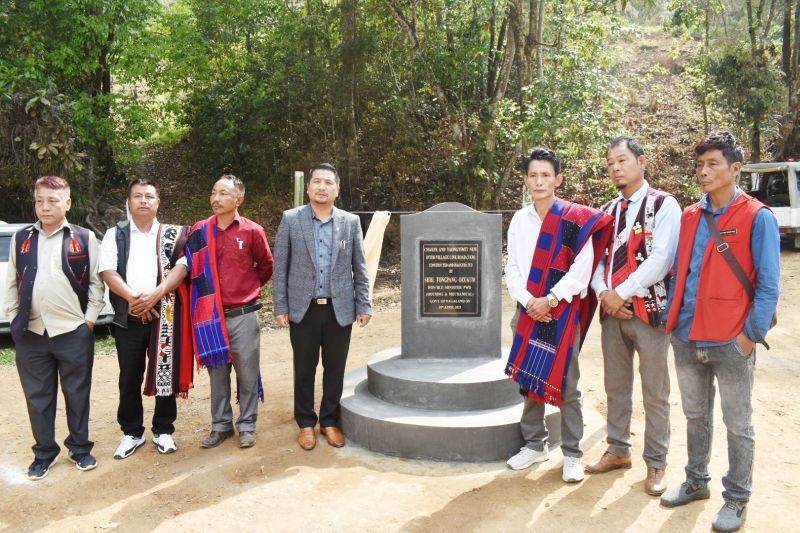 Minister for PWD (Mechanical & Housing), Tongpang Ozukum with village councils members of Chakpa village and Yaongyimti (New) at the inauguration of the inter village link road.
