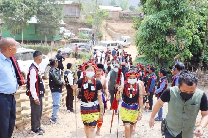 Minister for PHED Jacob Zhimomi being welcomed by Mapulumi Village members during the village adoption programme on April 21.