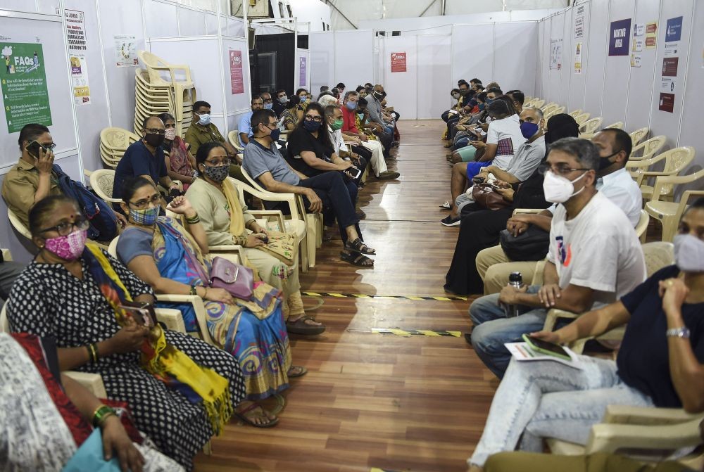Mumbai: People wait for their turn to receive a dose of COVID-19 vaccine, as coronavirus cases surge in Mumbai, Saturday, April 10, 2021. (PTI Photo/Kunal Patil)