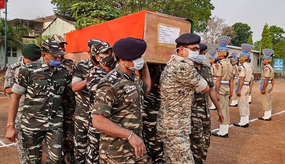 Bijapur: CRPF personnel carry the coffin of a paramilitary soldier who lost his life in an encounter with Maoists, in Bijapur district of Chhattisgarh, Sunday, April 04, 2021. (PTI Photo)