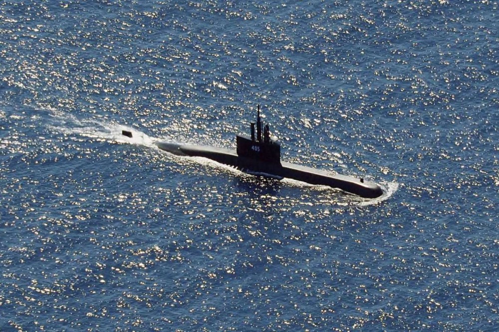 In this aerial photo taken from a maritime patrol aircraft of 800 Air Squadron of the 2nd Air Wing of Naval Aviation Center (PUSPENERBAL), the Indonesian Navy submarine KRI Alugoro sails during a search for KRI Nanggala, another submarine that went missing while participating in a training exercise on Wednesday, in the waters off Bali Island, Indonesia, Thursday, April 22, 2021. Indonesia's navy ships on Thursday were intensely searching for the submarine that likely fell too deep to retrieve, making survival chances for all the crew on board slim. Authorities said oxygen in the submarine would run out by early Saturday.Eric Ireng/AP Photo