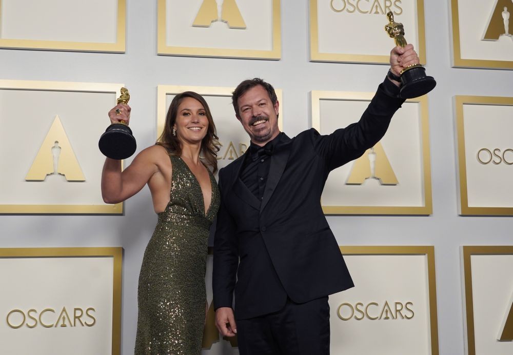 Los Angeles: Pippa Ehrlich, left, and James Reed pose in the press room with the award for best documentary feature for "My Octopus Teacher" at the Oscars on Sunday, April 25, 2021, at Union Station in Los Angeles.AP/PTI Photo