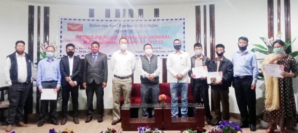 Awardees with K. Kevichusa and others during the ‘Review cum Award Function’ for employees of NE-II Region at Hotel Japfu, Kohima on April 10. (Morung Photo)