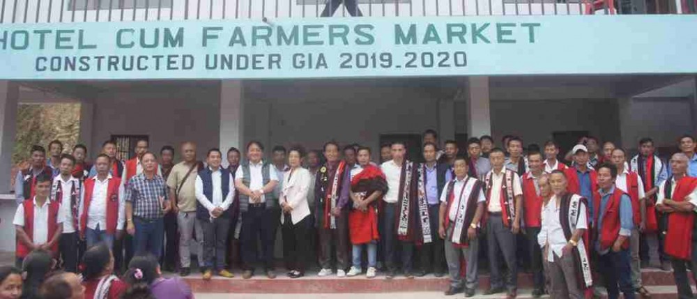 Minister Metsubo Jamir along with RD department officials, NDPP Mokokchung party leaders and Longsa village council members after inaugurating the ‘Hotel cum Farmer’s Market’ at Longsa-Suruhuto junction on April 14. (Photo Courtesy: Sashimeren Jamir)