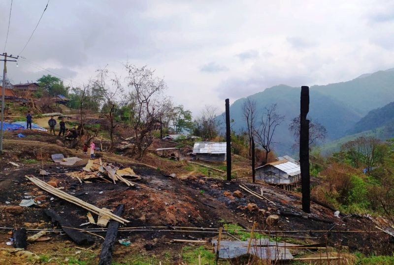 Portion of the damage caused by fire incident at Longliang village in Khonsa district .