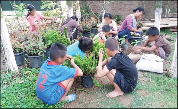 NK Keny works in a garden at Love Care Home with children in need of care. Mother’s Day gives us an opportunity to acknowledge the work of mothers who go beyond biological duties to give unconditional love and care to children despite any social status or recognition. (Photo Courtesy: Love Care Home)