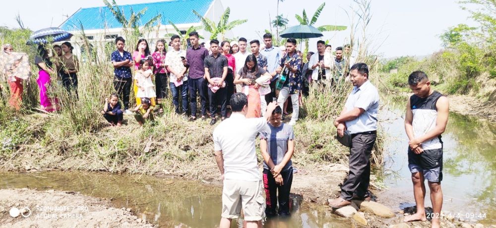 Youths being baptized on Easter Sunda at KCC Jalukie.