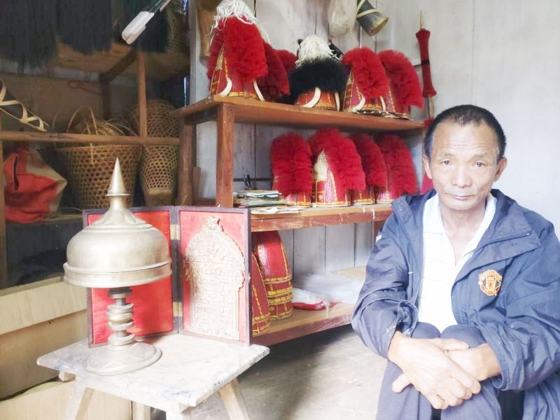 Bukhaio Khiamniungan is one of the few remaining craftsmen who make traditional Naga headgear. (Morung Photo)