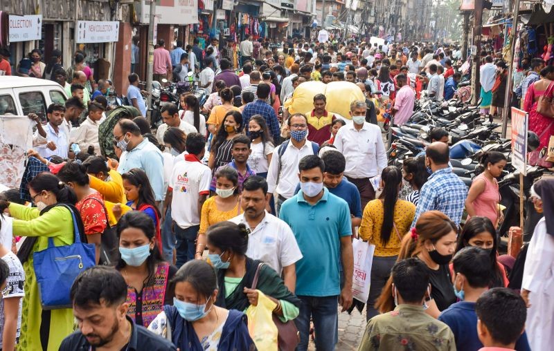 Guwahati: People, not adhering to social distancing norms, throng Fancy Bazar, ahead of the Rongali Bihu festival, amid coronavirus pandemic, in Guwahati, Friday, April 9, 2021. (PTI Photo)