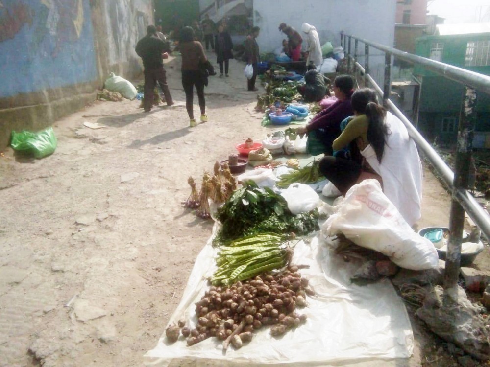 Naga women street vendors face a difficult life with no support to carry on their work under better conditions. The Entrepreneurs Associates is helping them adopt a savings culture apart from pushing the Nagaland State Government to promulgate the Street Vendors Act 2014. (Morung Photo)