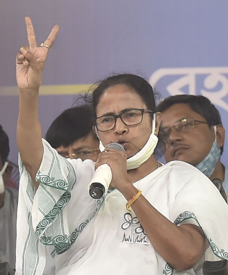 West Bengal Chief Minister and TMC supremo Mamata Banerjee addresses an election campaign rally in support of party candidates Ratna Chatterjee and Partha Chatterjee, ahead of the 4th phase of State Assembly polls, in Kolkata on April 8, 2021. (PTI Photo)