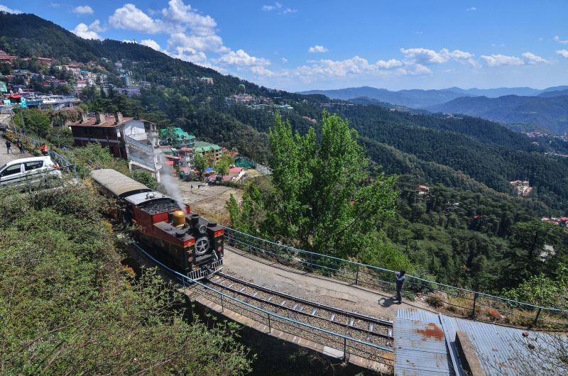 Shimla: A toy train runs on the Kalka-Shimla UNESCO World Heritage Railway Track on World Heritage Day, in Shimla, Sunday, April 18, 2021. (PTI Photo)