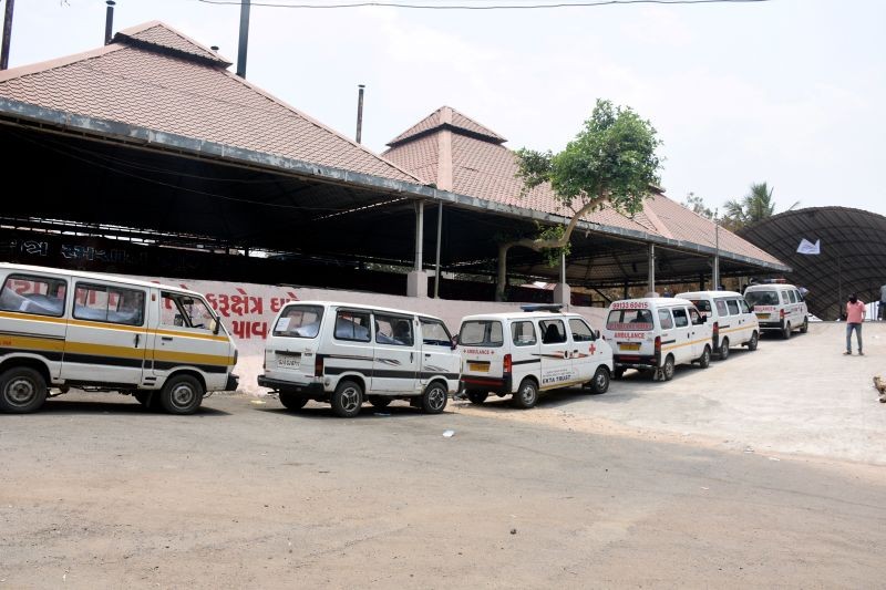 Ambulances, carrying bodies of people who died of COVID-19, parked outside the Jahagirpura Crematorium for their last rites, as coronavirus cases surge countrywide, in Surat on April 14, 2021. (PTI Photo)
