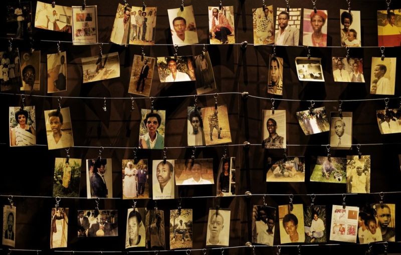 In this Friday, April 5, 2019 file photo, family photographs of some of those who died hang on display in an exhibition at the Kigali Genocide Memorial centre in the capital Kigali, Rwanda. A report commissioned by the Rwandan government due to be made public on Monday, April 19, 2021 concludes that the French government bears "significant" responsibility for "enabling a foreseeable genocide" that left more than 800,000 dead in 1994 and that that France "did nothing to stop" the massacres. (AP File Photo)