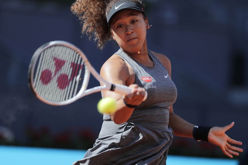 Madrid: Naomi Osaka of Japan returns the ball to Karolina Muchova of the Czech Republic during their match at the Madrid Open tennis tournament in Madrid, Spain, Sunday, May 2, 2021. AP/PTI Photo