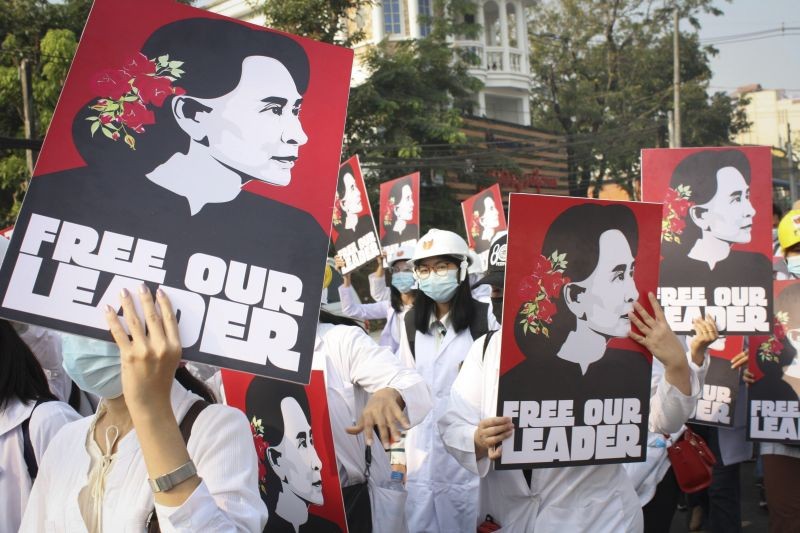 Medicals students display images of deposed Myanmar leader Aung San Suu Kyi during a street march in Yangon, Myanmar on Feb. 28, 2021. ( AP/PTI File Photo)