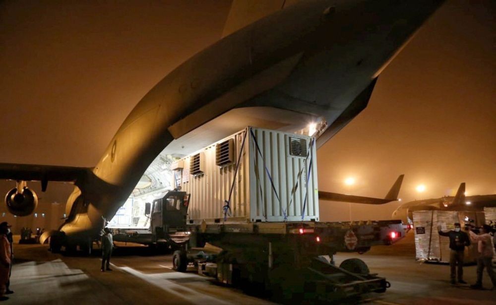 **EDS: IMAGE POSTED BY @COVIDNewsByMIB ON SATURDAY, MAY 8, 2021** New Delhi: An IAF aircraft carrying three oxygen generators & 360 Oxygen concentrators arrive in India from Israel. (PTI Photo)