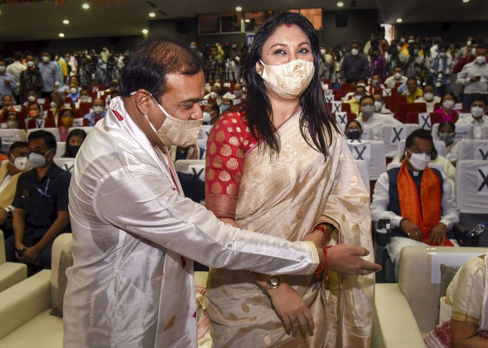 Guwahati: BJP's Himanta Biswa Sarma with wife Riniki Sarma before taking oath as the next Chief Minister of Assam, during his swearing-in ceremony at Srimanta Sankaradev Kalakshetra in Guwahati, Monday, May 10, 2021. (PTI Photo)