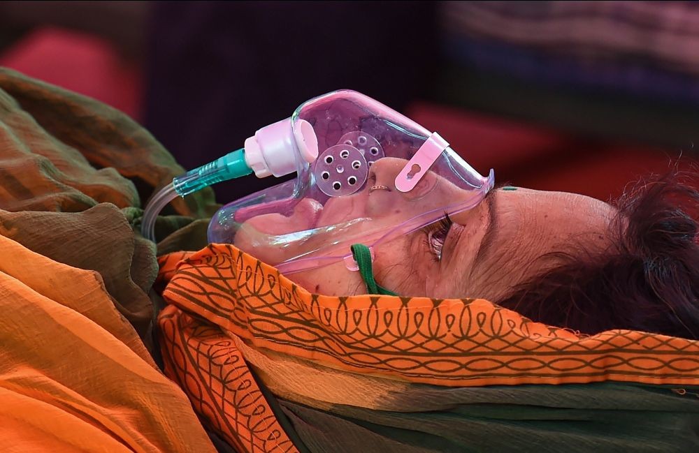 Ghaziabad: A COVID-19 patient receives free oxygen provided by Sikh organization, as coronavirus cases surge in record numbers across the country, in Indirapuram, Ghaziabad, Saturday, May 8, 2021. (PTI Photo/Atul Yadav)(