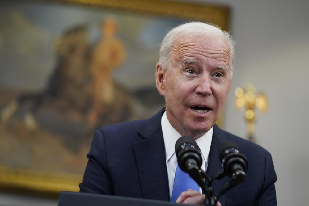 In this May 13, 2021 file photo, President Joe Biden speaks in the Roosevelt Room of the White House in Washington. Biden is asking U.S. intelligence agencies to “redouble” their efforts to investigate the origins of the COVID-19 pandemic. After months of minimizing the possibility that the coronavirus emerged from a lab accident, the administration is responding to both U.S. and world pressure for China to be more open about the outbreak. Biden said Wednesday there is insufficient evidence to conclude “whether it emerged from human contact with an infected animal or from a laboratory accident.” (AP Photo/Evan Vucci)