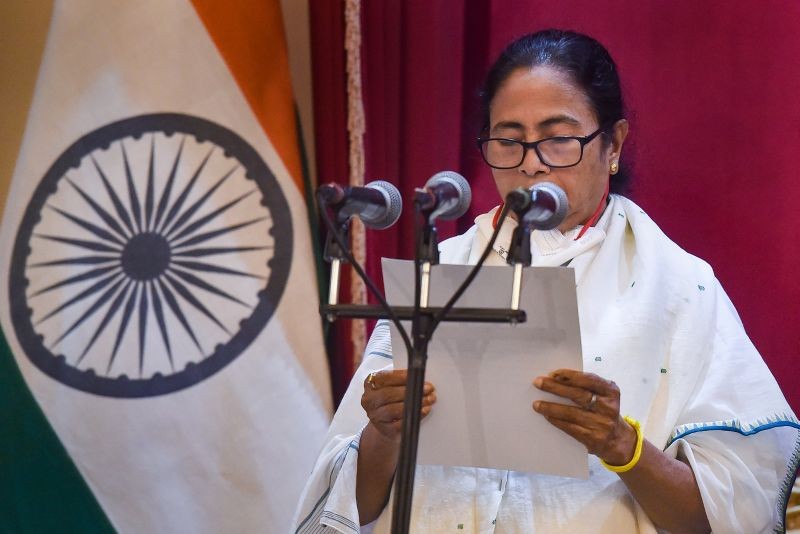 TMC Supremo Mamata Banerjee takes oath as the Chief Minister of West Bengal for the third time consecutively during her Swearing-in-Ceremony, at Governor House in Kolkata on May 5, 2021. (PTI Photo)