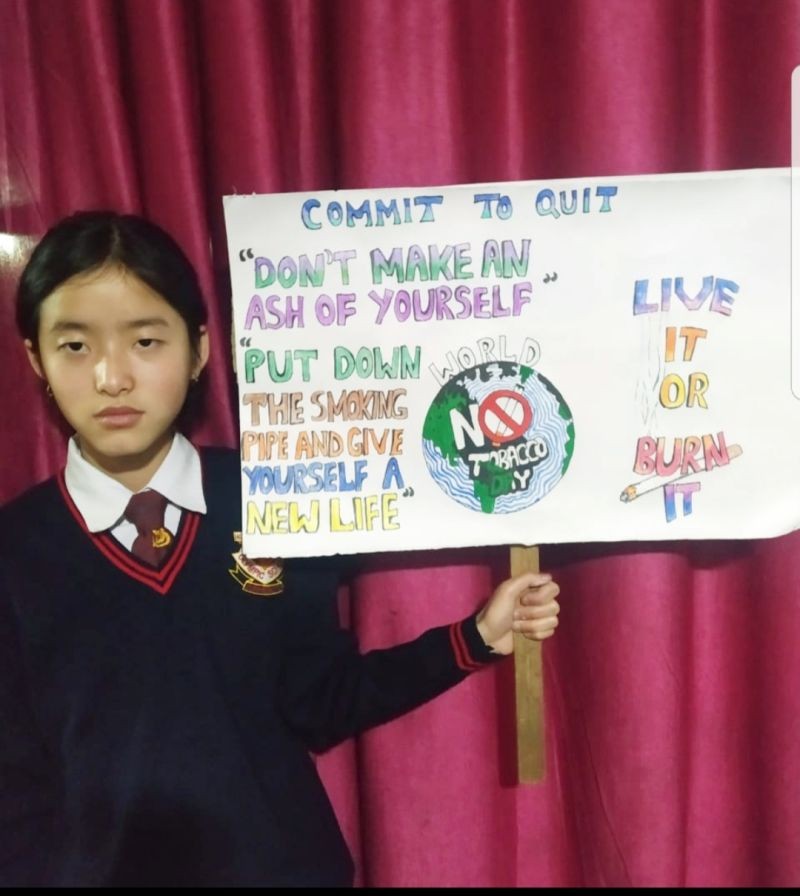 Winner of slogan competition organized by National Tobacco Control Programme, Zunheboto under the theme ‘Commit to Quit’ on May 31. (Photo Courtesy: CMO office Zunheboto)